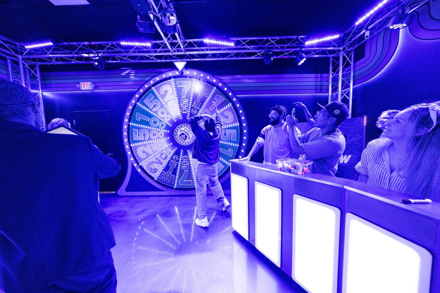 A contestant spinning the wheel at the Great Big Game Show.