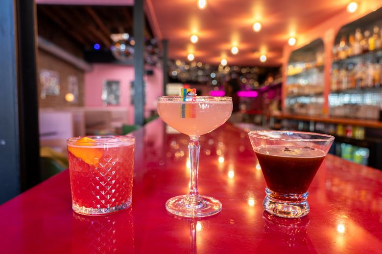 Hidden Gems serves pink cocktails to match its pink interior.
